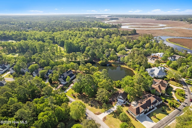 79 Plantation Passage Dr SE, Bolivia, NC 28422 - drone / aerial view featuring a water view, a residential view, and a wooded view