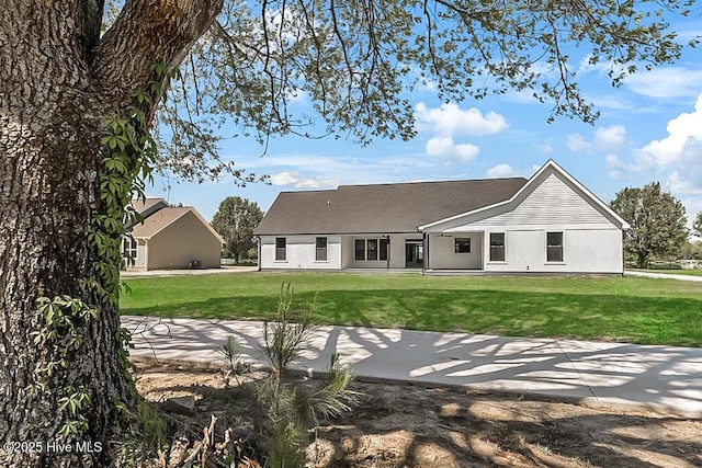 1104 Soundside Rd, Edenton, NC 27932 - rear view of property featuring a shingled roof and a lawn