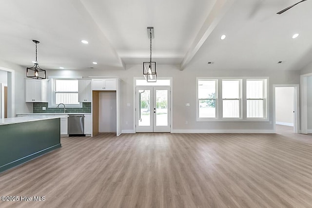 1104 Soundside Rd, Edenton, NC 27932 - unfurnished living room featuring light wood finished floors, baseboards, and recessed lighting