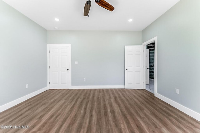 1104 Soundside Rd, Edenton, NC 27932 - unfurnished bedroom featuring wood finished floors, baseboards, ceiling fan, and recessed lighting