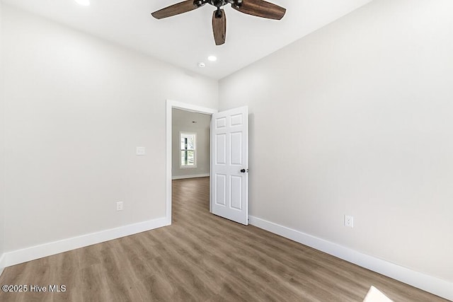 1104 Soundside Rd, Edenton, NC 27932 - unfurnished room with baseboards, a ceiling fan, and wood finished floors