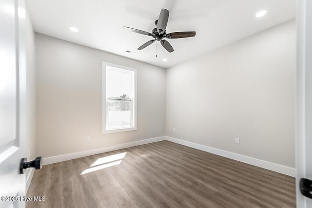 1104 Soundside Rd, Edenton, NC 27932 - unfurnished room with ceiling fan, baseboards, and wood finished floors
