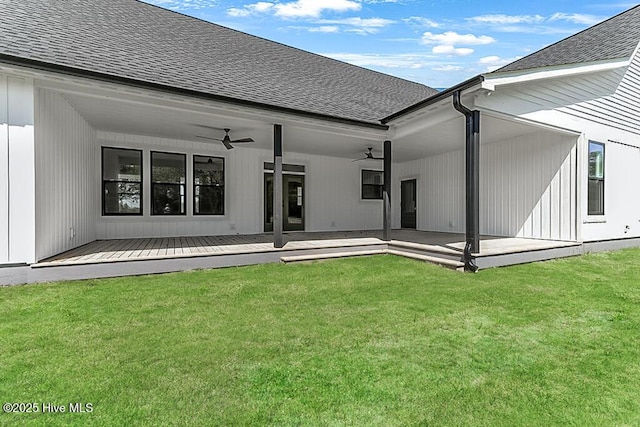 1104 Soundside Rd, Edenton, NC 27932 - rear view of property with a ceiling fan, a deck, roof with shingles, and a lawn