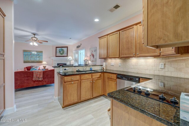 1105 Avebury Ct, Leland, NC 28479 - kitchen featuring a ceiling fan, stainless steel dishwasher, a sink, a peninsula, and light wood-style floors