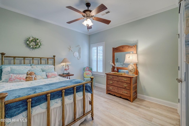 1105 Avebury Ct, Leland, NC 28479 - bedroom featuring baseboards, light wood-style flooring, crown molding, and visible vents