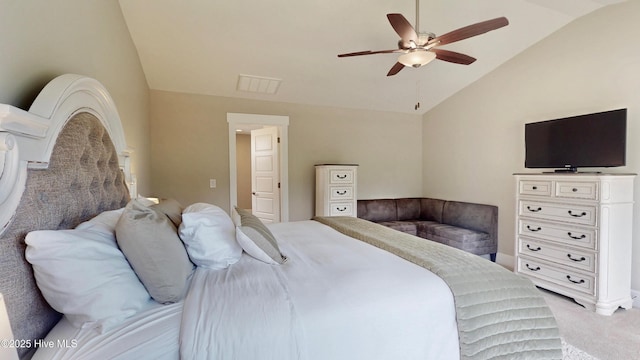 bedroom featuring vaulted ceiling, light colored carpet, ceiling fan, and visible vents