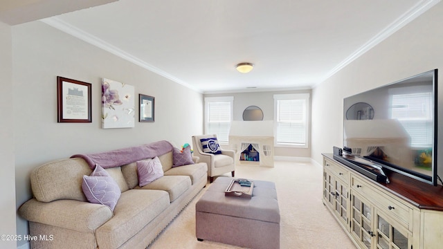 carpeted living room with ornamental molding
