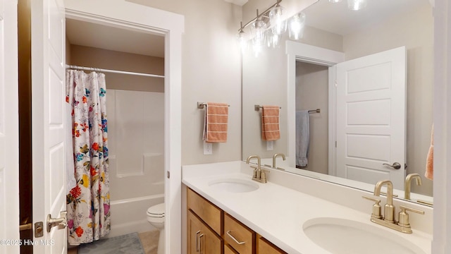 full bath featuring double vanity, toilet, shower / bath combination with curtain, and a sink