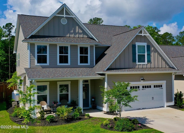craftsman house featuring concrete driveway, board and batten siding, a porch, and a shingled roof