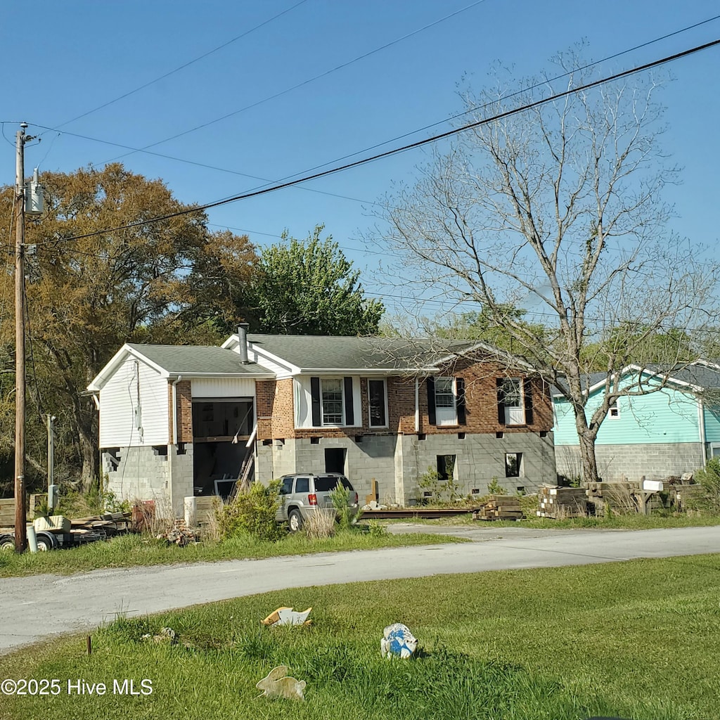 114 Graham Rd, Newport, NC 28570 - view of front of property with a front yard and brick siding