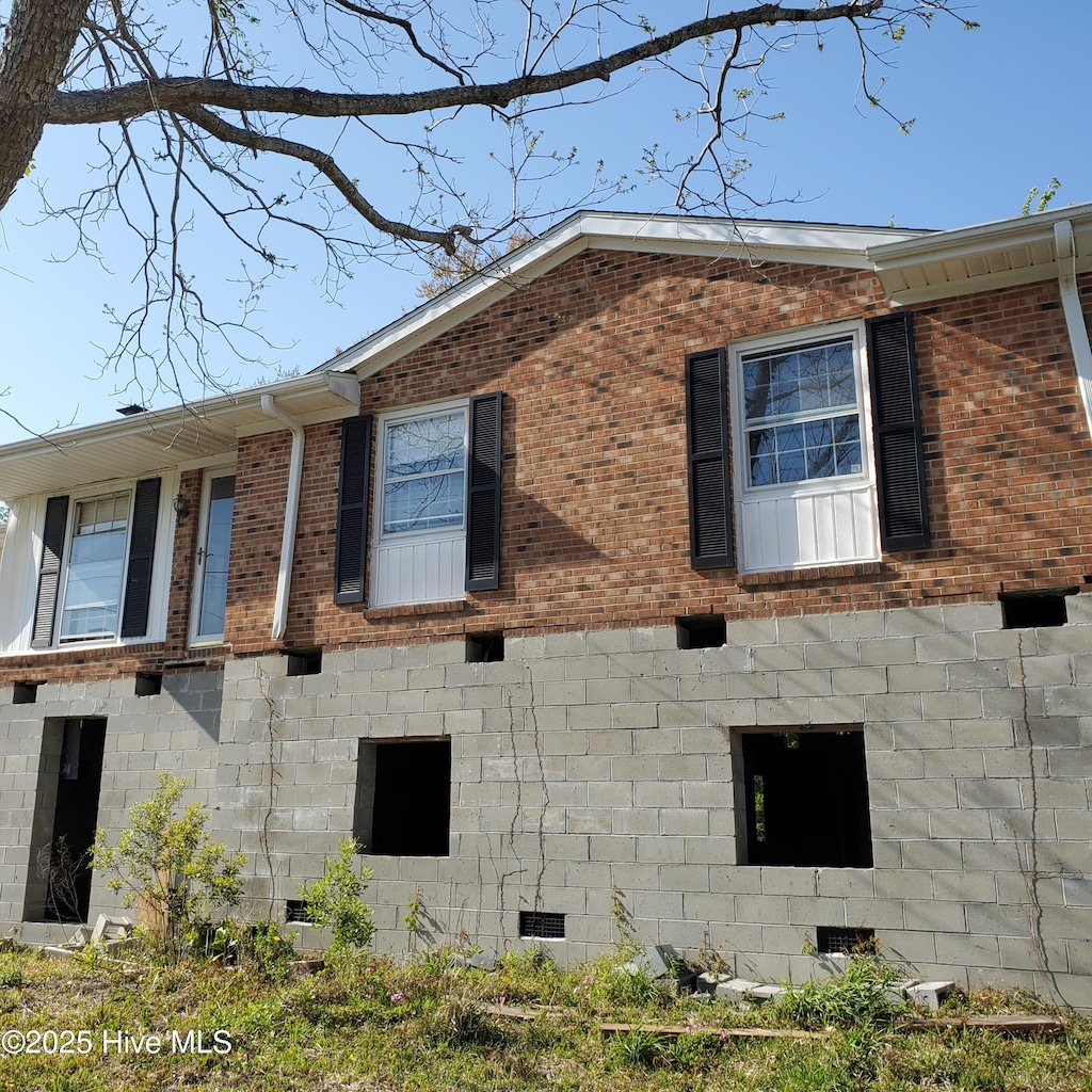 114 Graham Rd, Newport, NC 28570 - view of property exterior featuring crawl space and brick siding