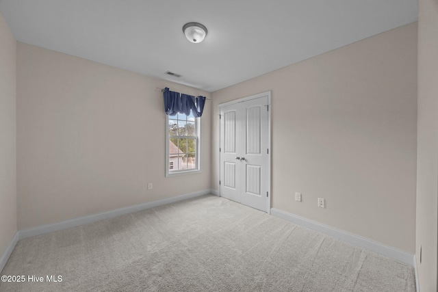 110 Costa Ct, Sneads Ferry, NC 28460 - unfurnished bedroom with carpet floors, baseboards, and a closet