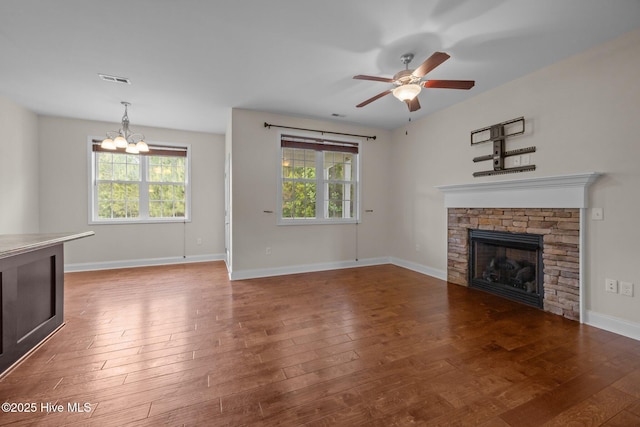 110 Costa Ct, Sneads Ferry, NC 28460 - unfurnished living room featuring hardwood / wood-style flooring, healthy amount of natural light, a fireplace, and ceiling fan