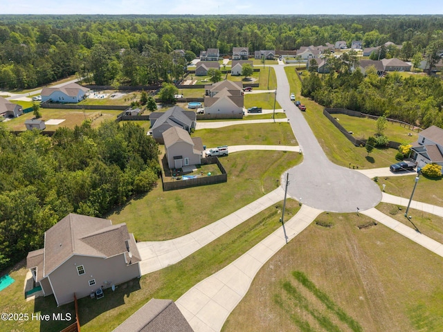 110 Costa Ct, Sneads Ferry, NC 28460 - aerial perspective of suburban area featuring a heavily wooded area
