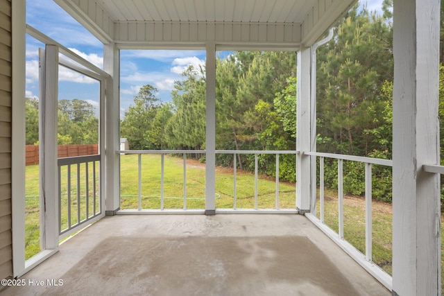 110 Costa Ct, Sneads Ferry, NC 28460 - unfurnished sunroom with view of scattered trees