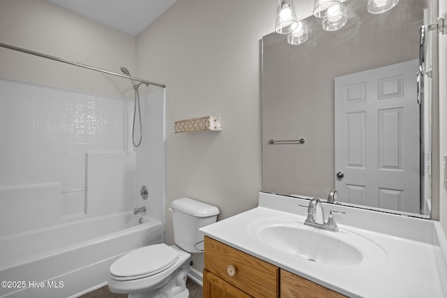 full bathroom with toilet, vanity, and bathtub / shower combination