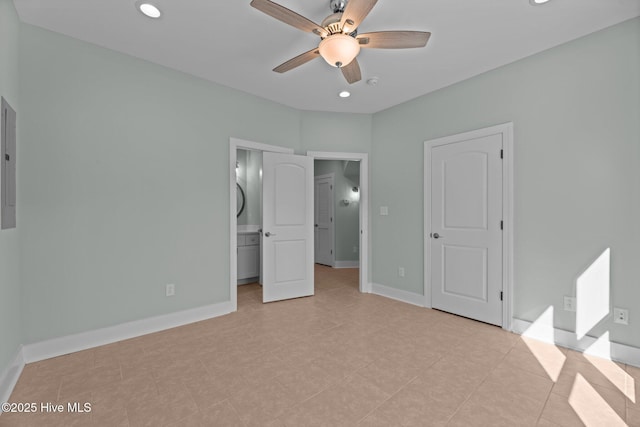 unfurnished bedroom with recessed lighting, a ceiling fan, baseboards, and electric panel