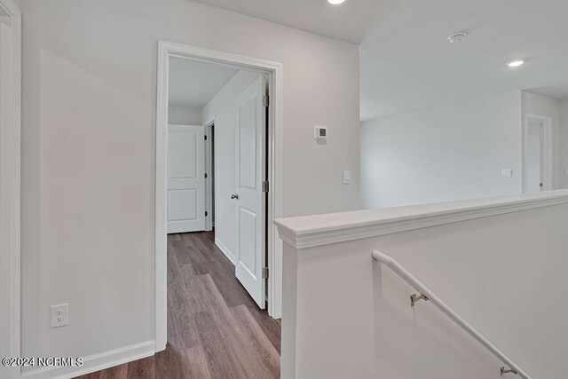 238 Kite Cir NE Lot 666, Bolivia, NC 28422 - corridor featuring wood finished floors and recessed lighting