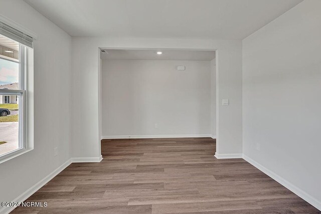 238 Kite Cir NE Lot 666, Bolivia, NC 28422 - empty room featuring baseboards and wood finished floors
