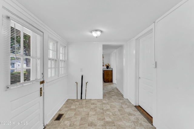 310 Chicopee Rd, Benson, NC 27504 - hallway featuring stone finish flooring and baseboards