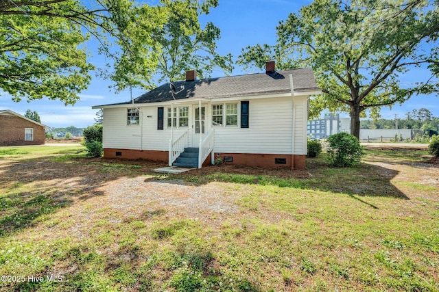 310 Chicopee Rd, Benson, NC 27504 - rear view of house with crawl space, a chimney, a yard, and entry steps