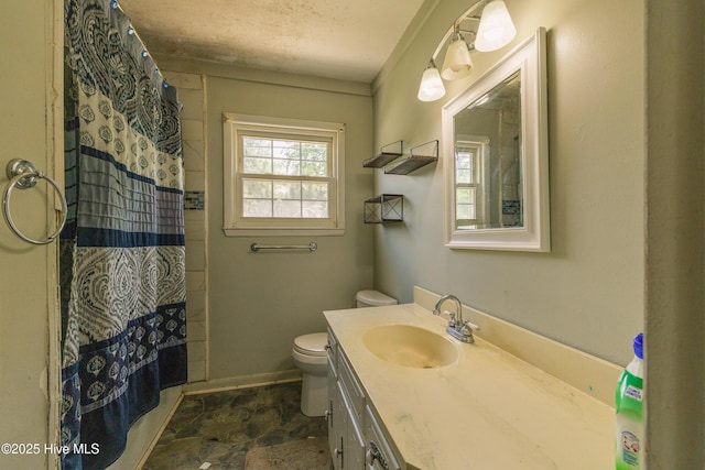 503 Spring St, Hamlet, NC 28345 - full bath featuring toilet, vanity, and a shower with curtain