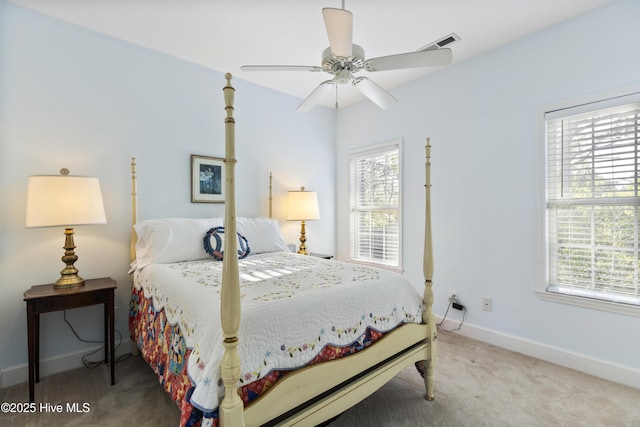bedroom featuring baseboards, multiple windows, carpet, and visible vents