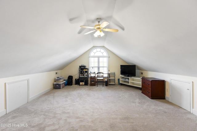 bonus room with carpet floors, a ceiling fan, and lofted ceiling