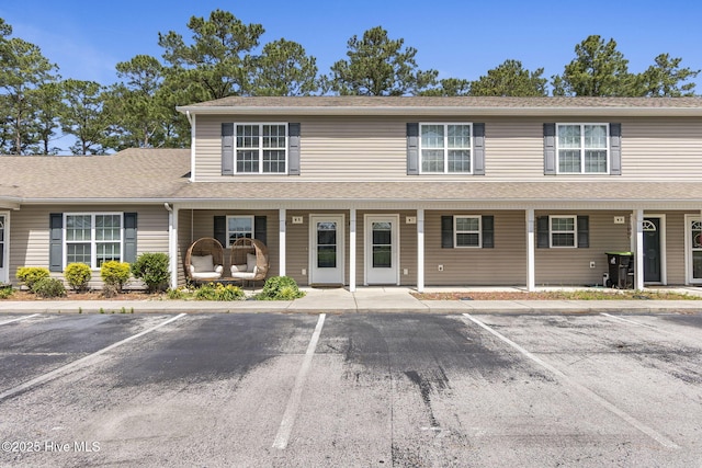 601 Pelletier Loop Rd Unit M76Silver, Creek Townhomes, Peletier, NC 28584 - multi unit property featuring uncovered parking and a porch
