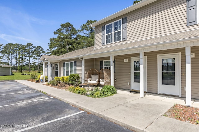 601 Pelletier Loop Rd Unit M76Silver, Creek Townhomes, Peletier, NC 28584 - view of front of home with a porch and uncovered parking