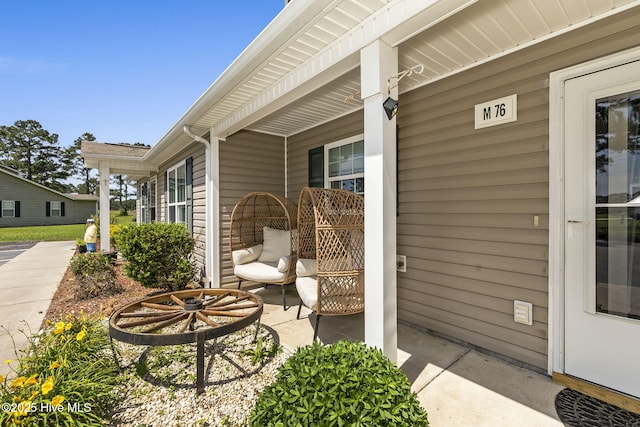 601 Pelletier Loop Rd Unit M76Silver, Creek Townhomes, Peletier, NC 28584 - view of patio / terrace with a porch