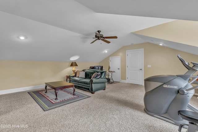living room featuring baseboards, ceiling fan, carpet flooring, and lofted ceiling