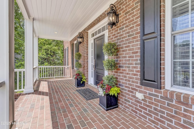 view of patio featuring a porch
