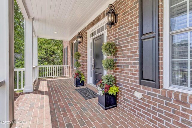 104 River Ct, Wilmington, NC 28412 - view of patio featuring covered porch