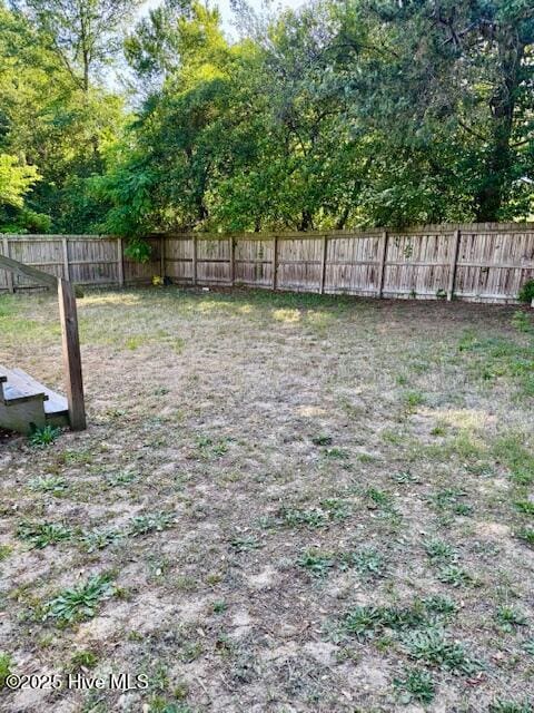 view of yard featuring a fenced backyard