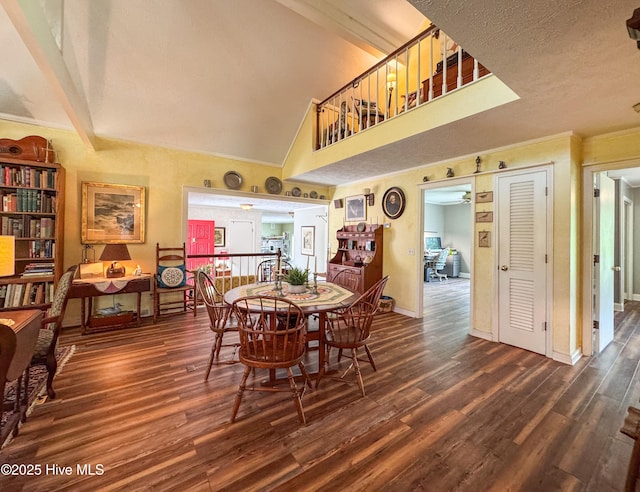 522 Hughes Rd, Hampstead, NC 28443 - dining room featuring wood finished floors, baseboards, ornamental molding, and a high ceiling