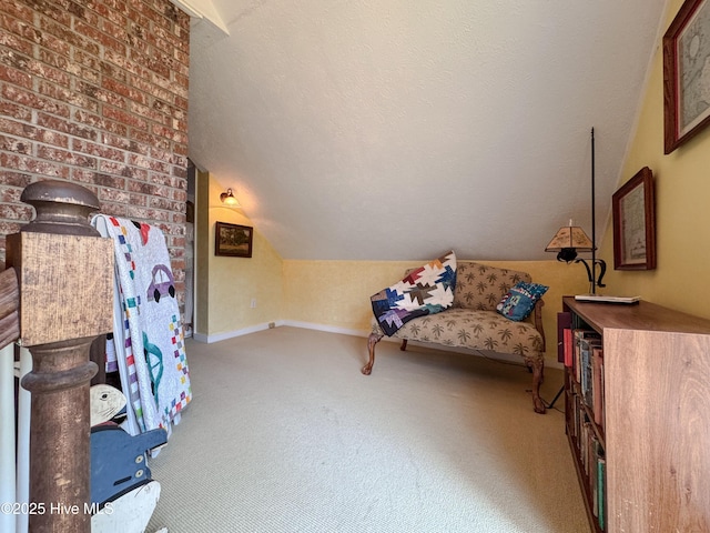 522 Hughes Rd, Hampstead, NC 28443 - living area featuring lofted ceiling, carpet flooring, and baseboards