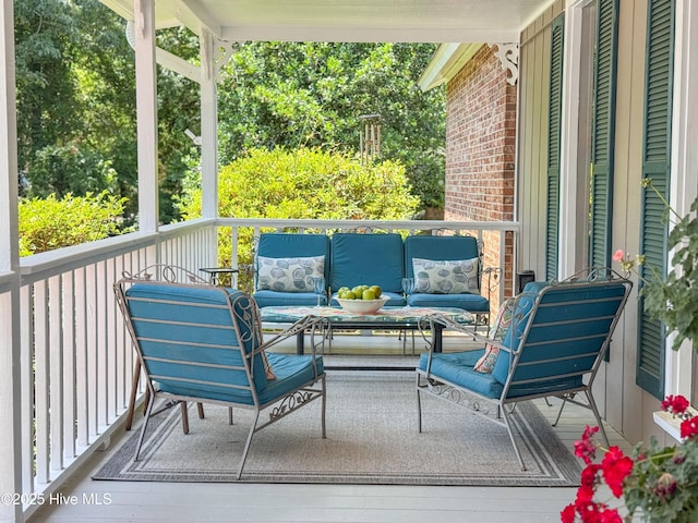522 Hughes Rd, Hampstead, NC 28443 - balcony featuring an outdoor hangout area