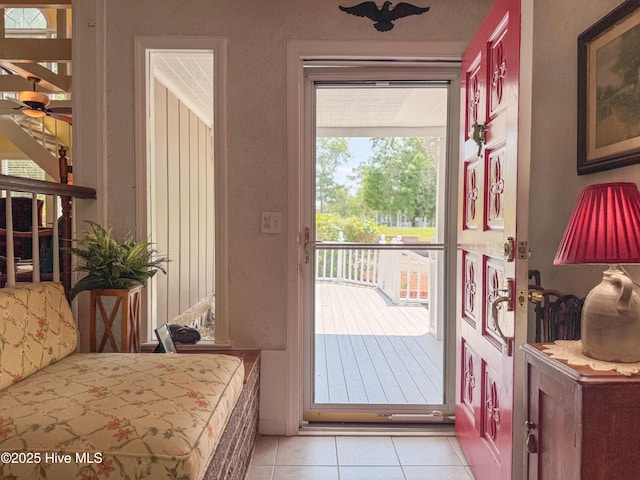 522 Hughes Rd, Hampstead, NC 28443 - entryway with light tile patterned floors and a ceiling fan