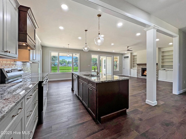 1102 Soundside Rd, Edenton, NC 27932 - kitchen featuring appliances with stainless steel finishes, a sink, ceiling fan, baseboards, and recessed lighting