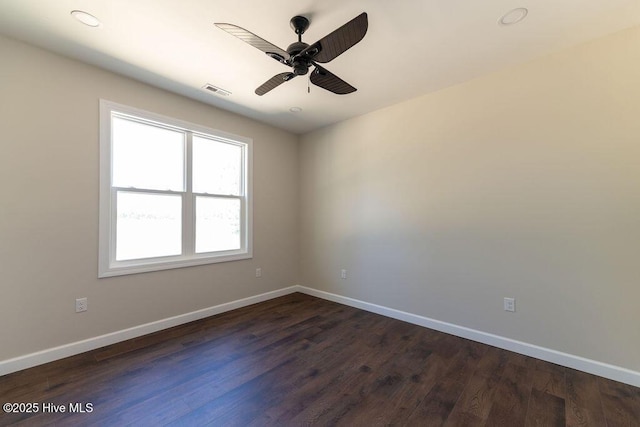1102 Soundside Rd, Edenton, NC 27932 - unfurnished room featuring baseboards, ceiling fan, and dark wood-style floors