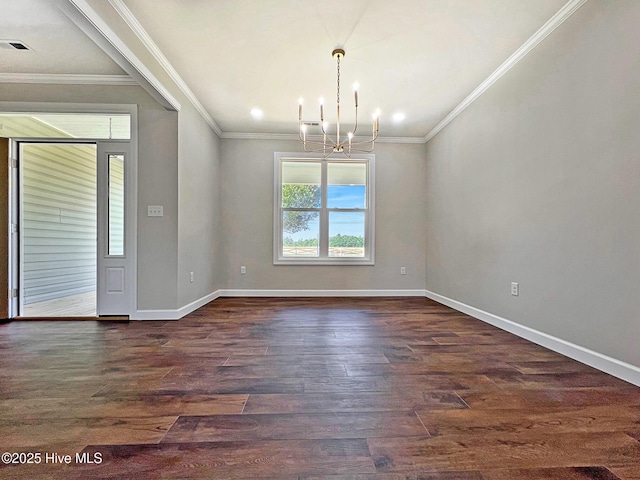 1102 Soundside Rd, Edenton, NC 27932 - empty room featuring a chandelier, dark wood-style flooring, baseboards, and crown molding