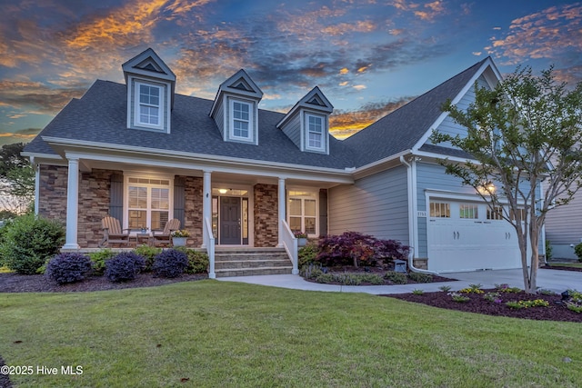 2753 Ligustrum Ct, Southport, NC 28461 - new england style home featuring a yard, roof with shingles, covered porch, and driveway