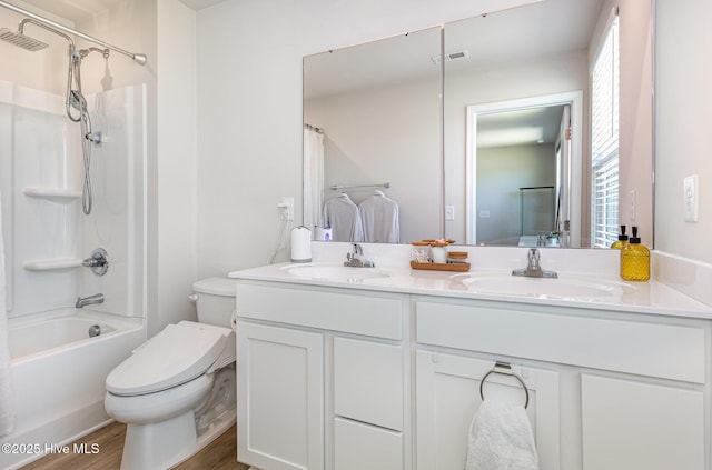 8840 Shallow Creek Trl, Bailey, NC 27807 - bathroom with a sink, toilet, double vanity, and wood finished floors