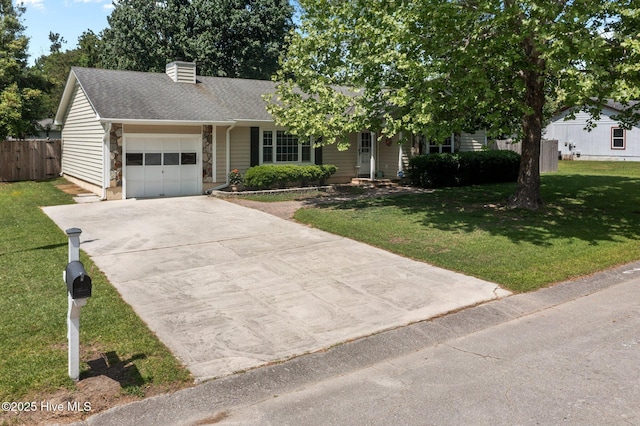 view of front of home with a chimney, fence, a garage, a front lawn, and concrete driveway