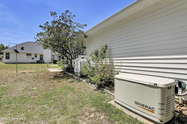 view of yard with central AC