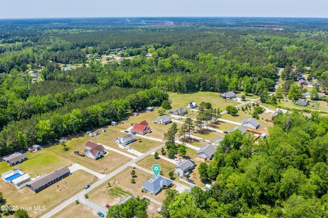bird's eye view with a view of trees