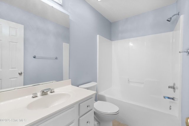 full bath with toilet, shower / bathing tub combination, and vanity