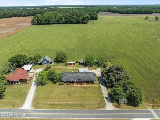 birds eye view of property featuring a rural view