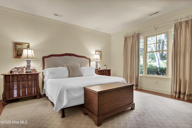 7102 Saybrook Dr, Wilmington, NC 28405 - bedroom featuring crown molding, baseboards, and wood finished floors